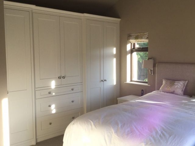 Bedroom with built-in media and TV solutions