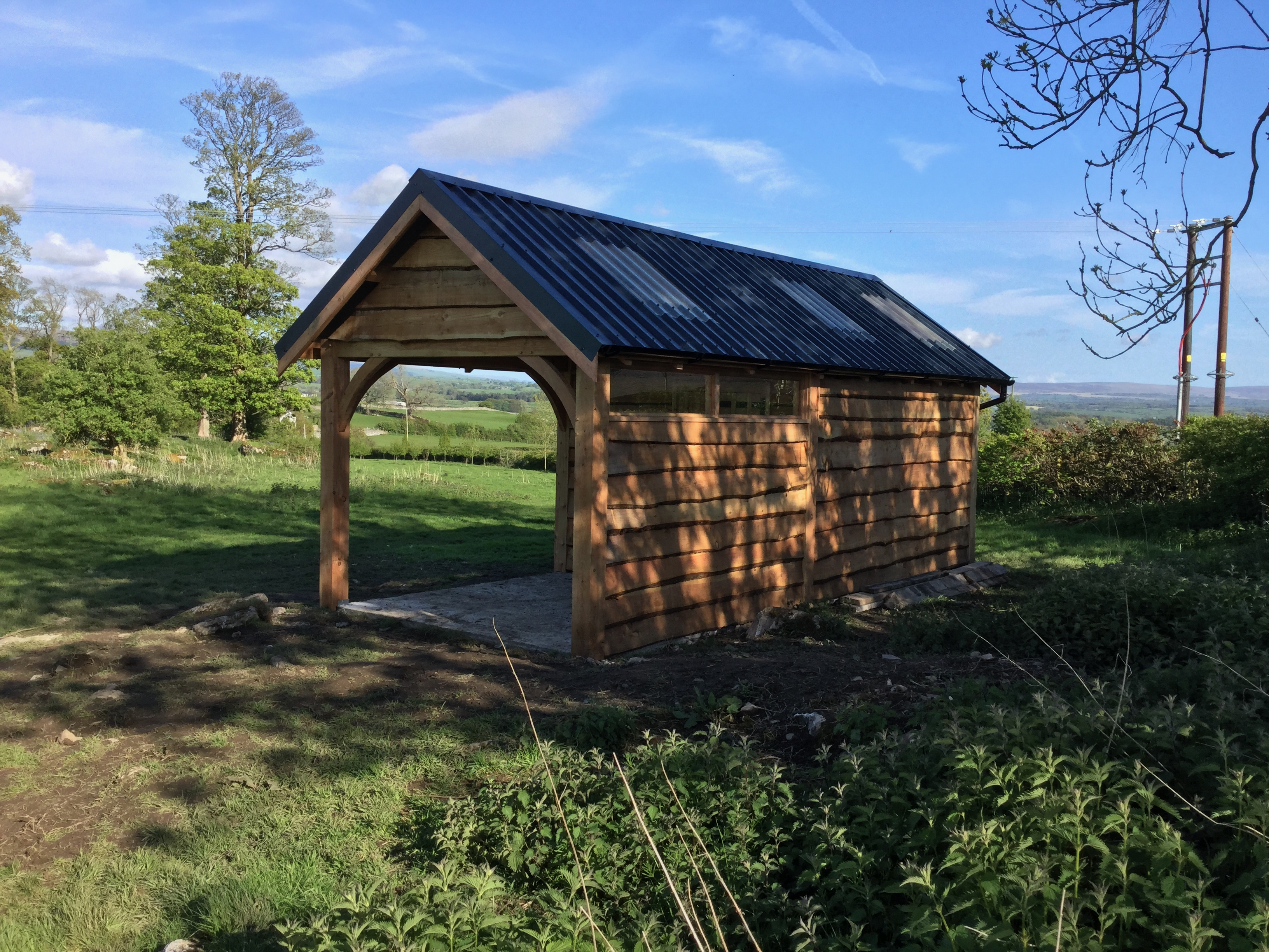 Oak-framed garage or carport by Woodstyle Joinery
