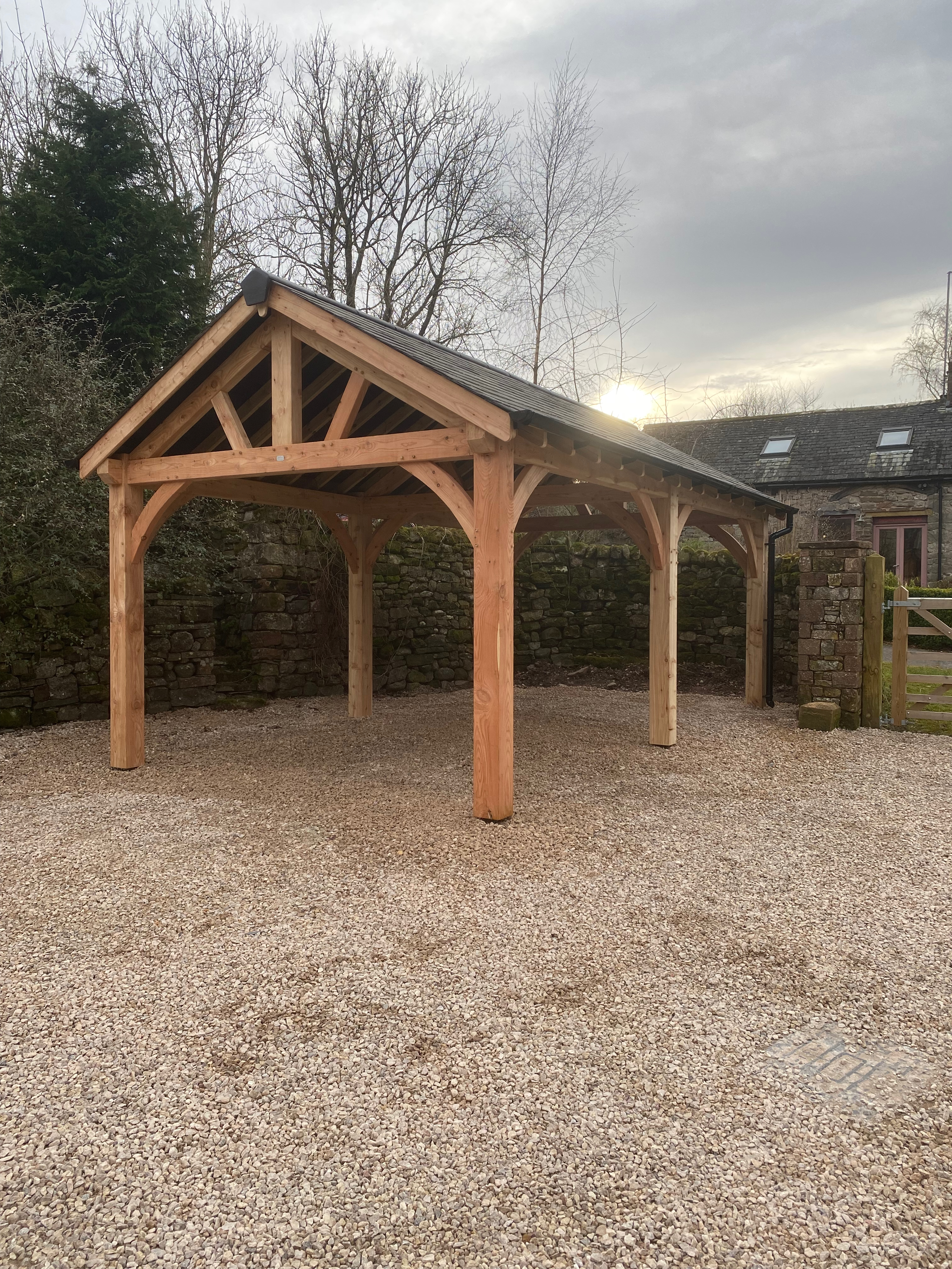 Oak-framed garage or carport by Woodstyle Joinery