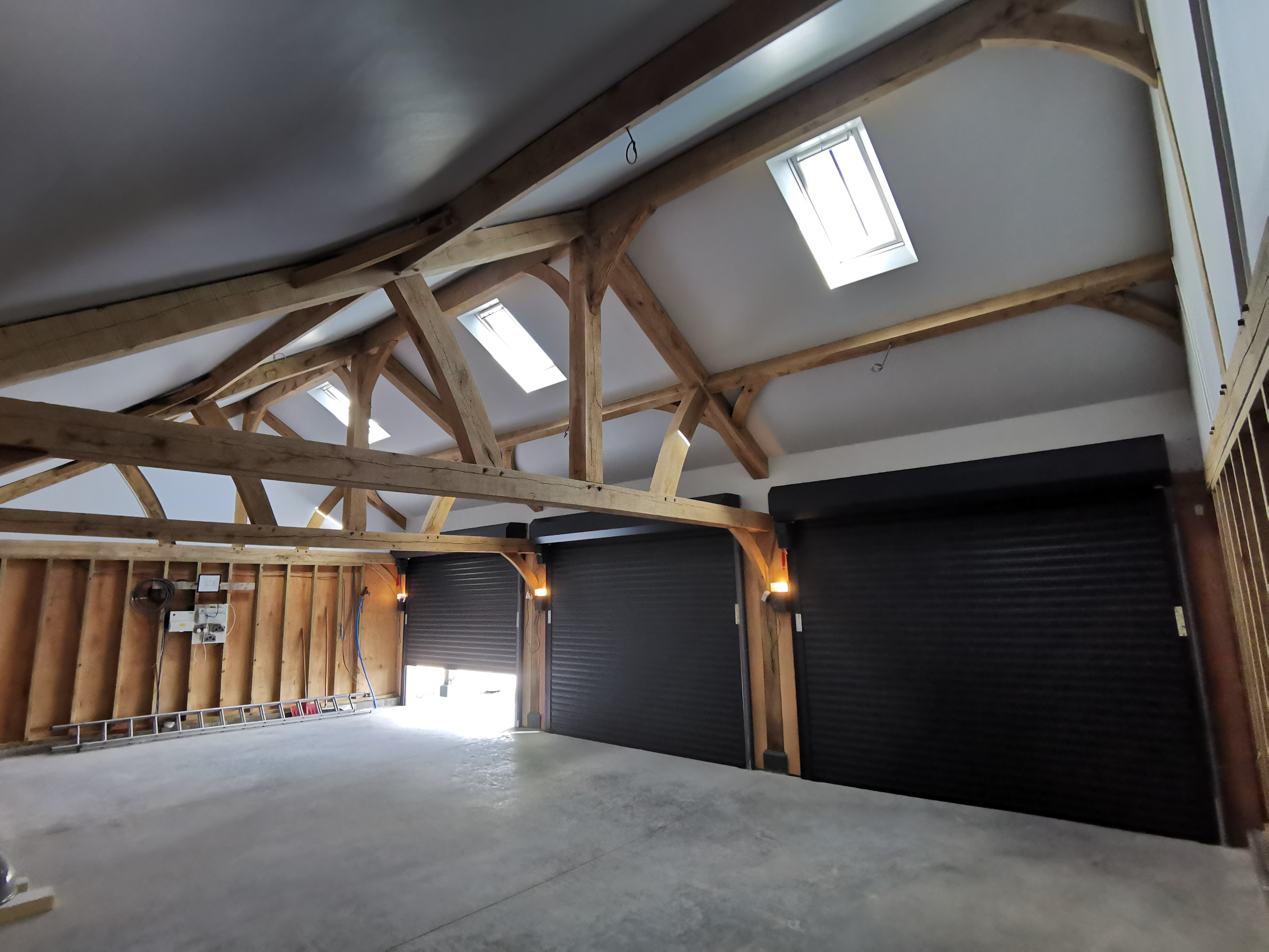 Oak-framed garage or carport by Woodstyle Joinery